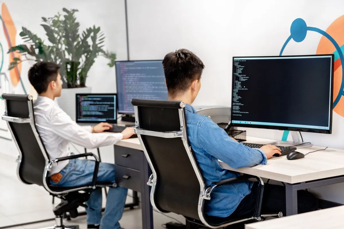 Creative professional working on video animation and motion graphics at a desktop workstation